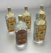 A collection of five 20thc Gordons Dry Gin, 47.3% vol, 1.125ltr, level 5cm to top, some damage to