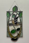 An Art Deco Art Glass flower coloured panel. (53cmx24cm)
