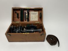 A cased W.F. Stanley & Co New Eltham Theodolite, instrument no. 4541, together with a brown