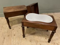 A pair of Georgian mahogany-framed bidets, with lift-off lid to top revealing fitted basin, raised