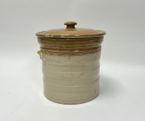 A large stoneware two-toned storage bin with cover and twin handles to sides, impressed mark to side