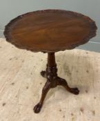 An Edwardian mahogany tilt-top tripod table, in the Georgian style, with pie-crust circular top over
