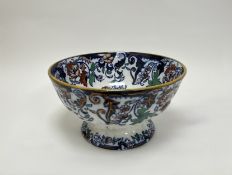 A late 19thc Japanese Amherst ironstone pedestal fruit bowl decorated in the Imari palette, marked