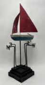 Ramsay Gillies, a contemporary Folk Art-inspired weather vane, decorated with a raised red-sailed