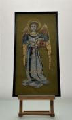An late 19thc Scottish Art and Crafts sewn work panel of an angel with painted face and hands worked
