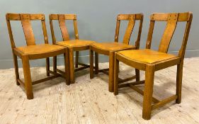 A set of four 1930s oak dining chairs, bentwood toprail with forward projecting splat, over a