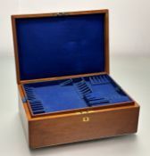 An Edwardian mahogany canteen containing a part suite of epns single struck Kings pattern flatware
