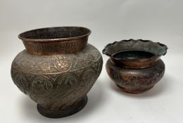 An early 20thc Middle Eastern copper planter of bulbous form, embossed with foliate and bird
