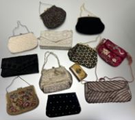 A collection of ladies vintage evening purses comprising, one with stitched flowers and birds, one