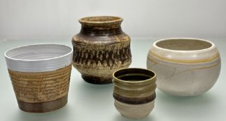 A collection of plant pots comprising, a circular studio pottery plant pot (signed in pen S verso