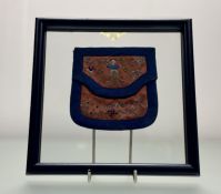 A pair of clear glass mounted framed 19thc Chinese silk embroidered purses, in worked coloured