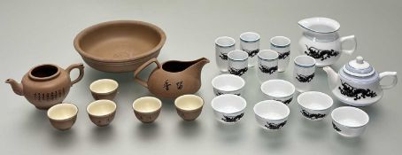A modern traditional chinese brown clay tea ceremony service comprisng a teapot, six tea bowls, a