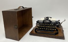 A Blick model '9' 9 &10 Cheapside London portable typewriter with original oak base and cover,