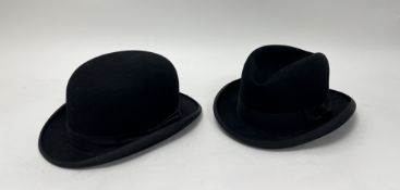 A Cunningham & Co. black felt bowler hat with leather band inscribed Woodrow, Piccadilly, London