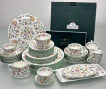 A large collection of Minton Haddon Hall pattern dinner service comprising, eight side plates (w-