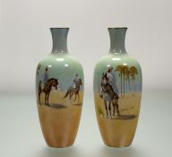 A pair of Royal Doulton vases with Orientalist decoration, c. 1920, painted by Harry Allen, each