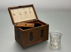 A George III inlaid mahogany tea caddy, late 18th century, the cover and sides inlaid with oval