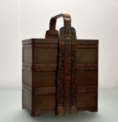 A Chinese bamboo and rattan food or picnic basket, of three tiers, with brass mounts. 53cm by 37.5cm