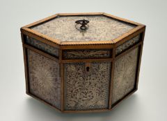 A George III satinwood and rolled paper tea caddy, c. 1800, of shaped hexagonal frame, with 
