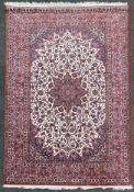 A very fine Persian Isfahan rug, the central medallion surrounded by all-over palmettes and
