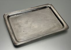 A George V silver dressing table tray, Kemp Brothers, London 1925, rectangular. 19.25cm by 27cm,
