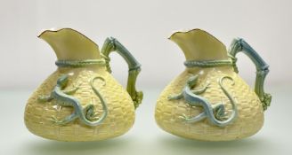 A pair of Royal Worcester shape 1714 jugs, the bag-shaped bodies with basket-weave moulded and