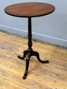 An early 19thc mahogany snap top occasional table on turned fluted column and tripod base (h.72cm