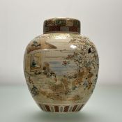 A Satsuma pottery jar and cover, Meiji period, c. 1900, the jar decorated with thatched buildings,