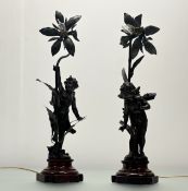 After Auguste Moreau, a pair of patinated metal figural lamps in the Art Nouveau taste, early 20th
