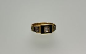 A three stone diamond and enamel mourning ring, late 19th century, centred by a round old