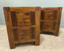 A pair of contemporary Eastern hardwood bedside chests, with banded plank tops over two drawers to
