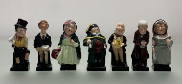 A collection of seven Royal Doulton From the Works of Charles Dickens figures comprising, Oliver