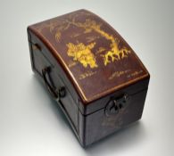 A Chinese leather covered letter box with gilt decroation depicting two children playing beneath a