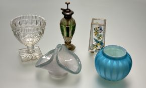 A collection of decorative glassware comprising, a rectangular vase, raised on four ball feet with