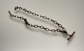 An Edwardian 9ct gold oval link albert with t bar and lobster claw fastening: l. x 45cm 32.2g