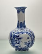 A Chinese blue and white vase with various traditional panel scenes to body, with scrolling floral