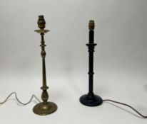 An early 20thc brass table lamp of baluster form, raised on a circular base (h. 46.5cm), together