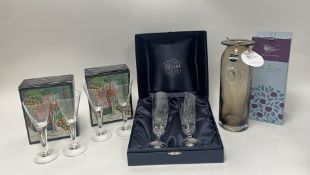 A set of four Dartington Sharon sherry glasses designed by Frank Thrower, in two boxes, together
