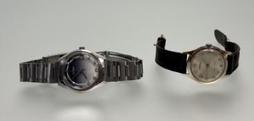 A vintage gilt metal Ingersol manual wind wristwatch with silvered dial and Arabic numerals and