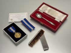 An Edwardian Birmingham silver cased pocket colmb with engine turned decoration: l. x 10cm