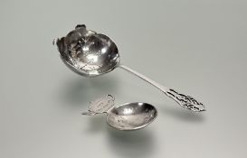 A Sheffield silver loose leaf tea stainer with pierced scalloped bowl and handle: l. x 14cm w. x 5.