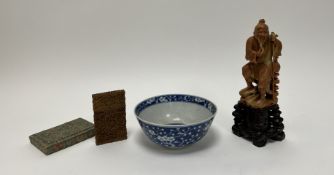 A late Qing Dynasty Chinese blue and white porcelain footed bowl with prunus design, with Kangxi