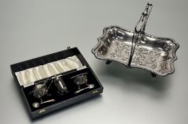 An Edwardian epns scalloped swing handled fruit basket: h. x 22cm l. x 29cm and an epns boxed