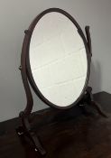 A late 19thc mahogany vanity mirror of oval form (h. 57cm)
