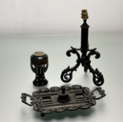 A collection of decorative desk wares comprising, a cast metal ornate ink stand, with twin