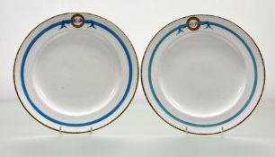 A pair of Minton by John Millar & Co plates, with cote of arms reading - 