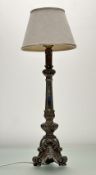 A tasteful wooden table lamp, in silver distress paint raised on three scroll feet with mirror