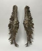 Ramsay Gillies, an intricately carved pair of gilded wooden wings, with wall hanging hooks verso (l.