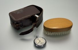A 1930s chrome open face pocket watch with silverd dial and arabic numerals and secoands dial