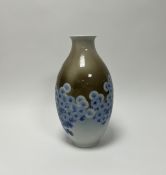 A early 20thc Japanese Meiji period Arita ware vase of bulbous form, decorated with blue flowers and